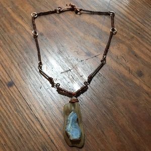 A copper drift wood necklace with a Oregon agate.